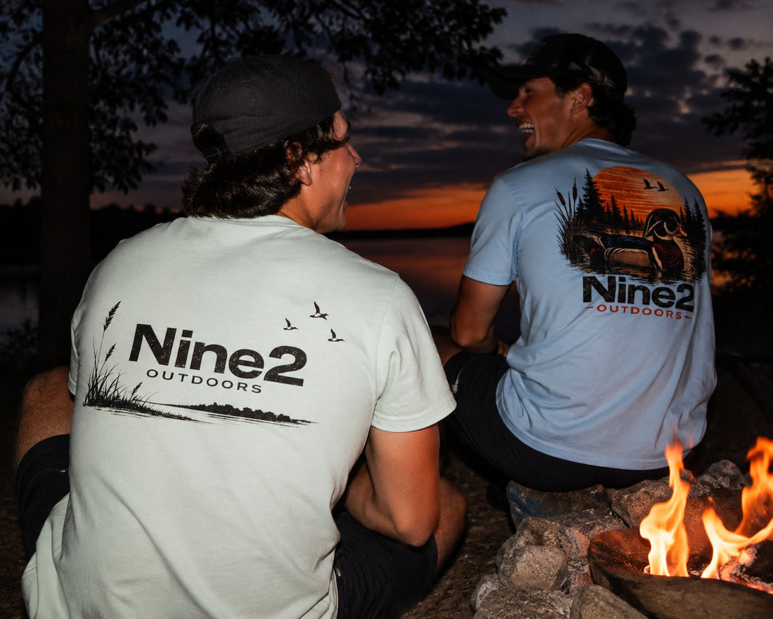 Campfire by a lake at dusk