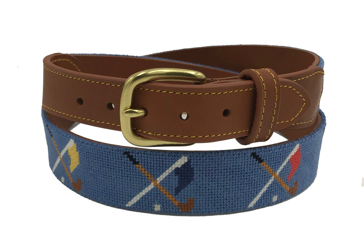 Needlepoint belt with crossed golf clubs and flags